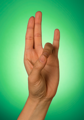 Agni Mudra hand position on a green backdrop