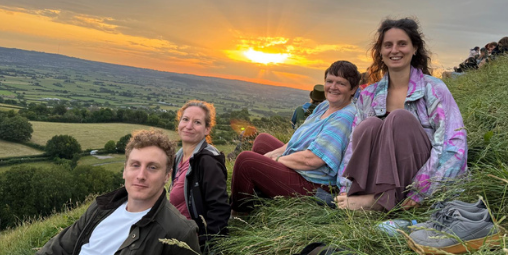 Group at sunrise on the Tor